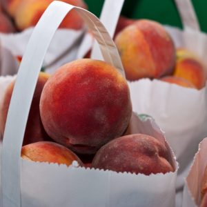 Pile of bags of peaches